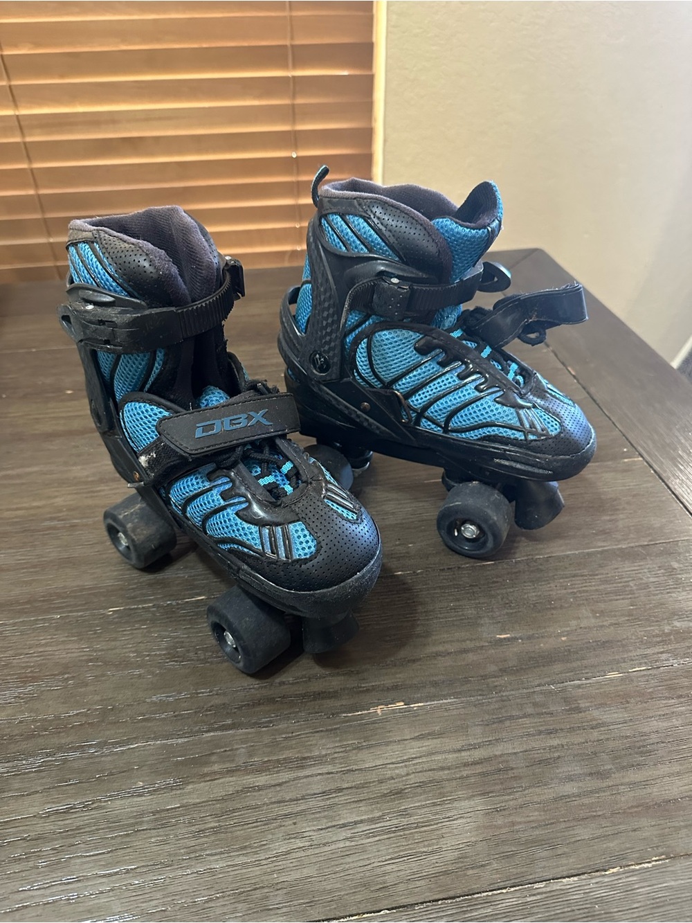 Kids' DBX Sz 1-4 adjustable Blue and Black Quad Roller Skates